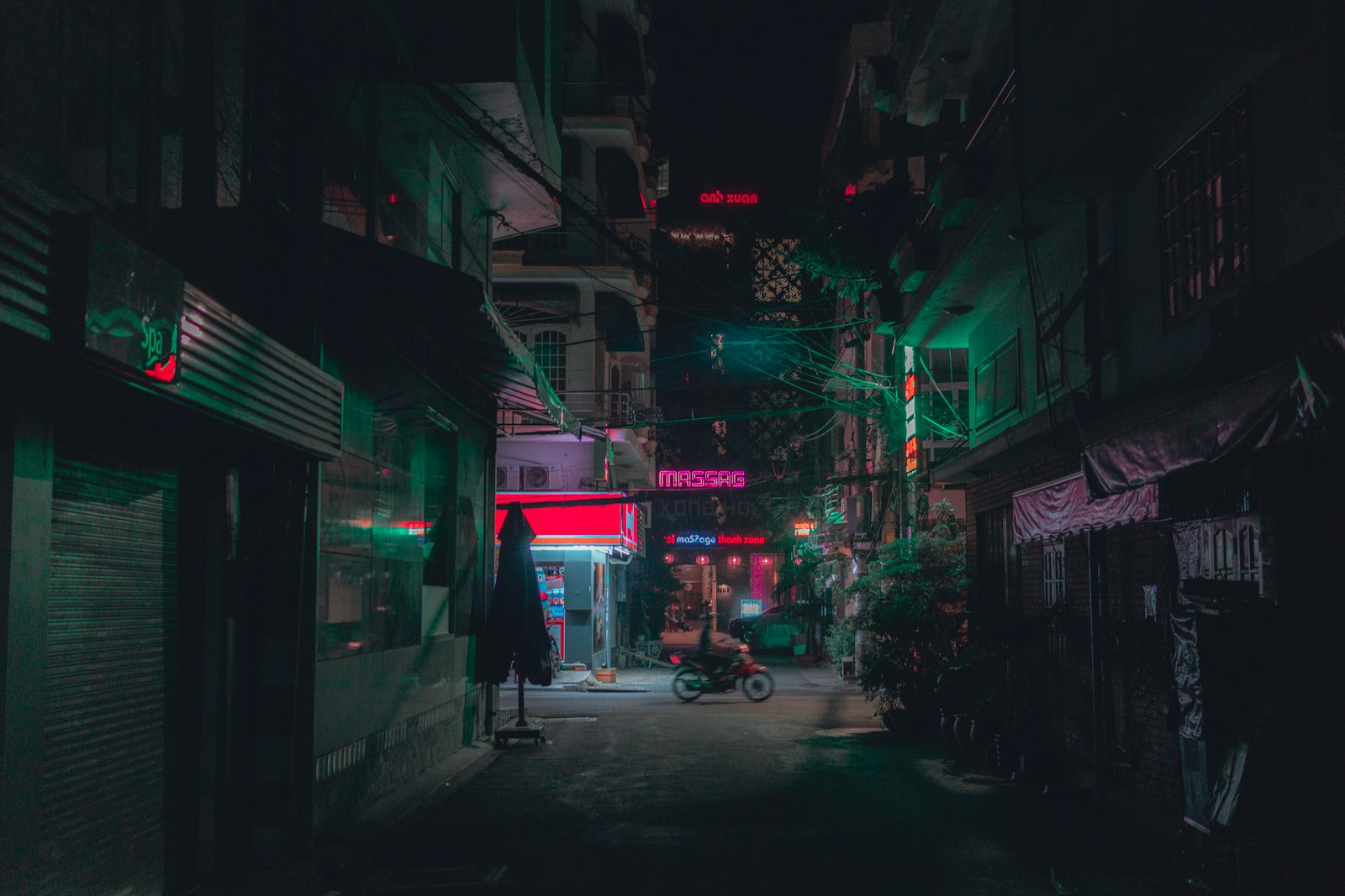 Night alley with neon signs